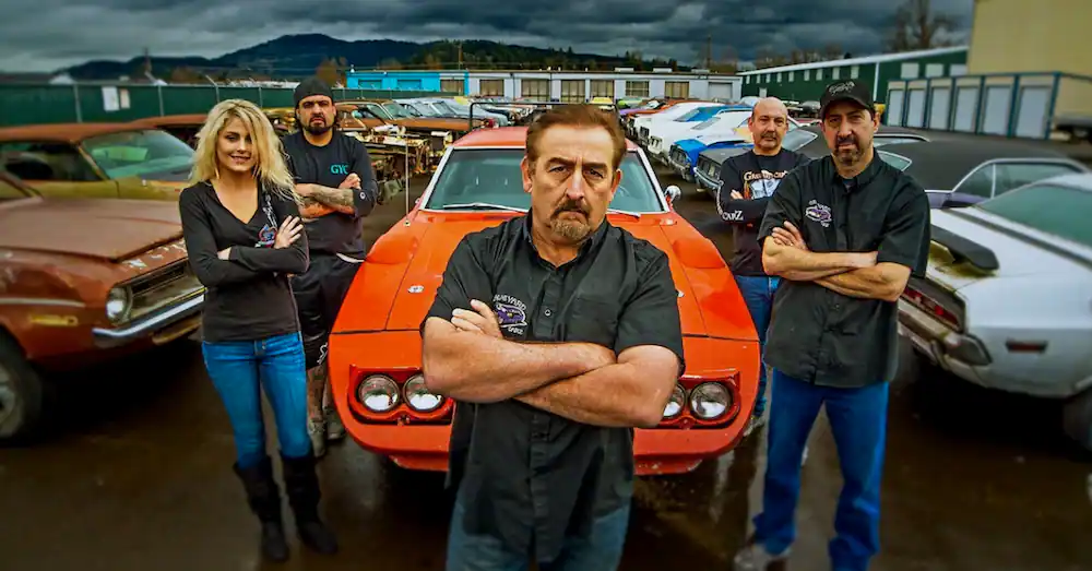 Image of Mark Worman with his crew who are also the cast of TV show Graveyard Carz. The crew in the photo include, his daughter, Allysa Worman and others